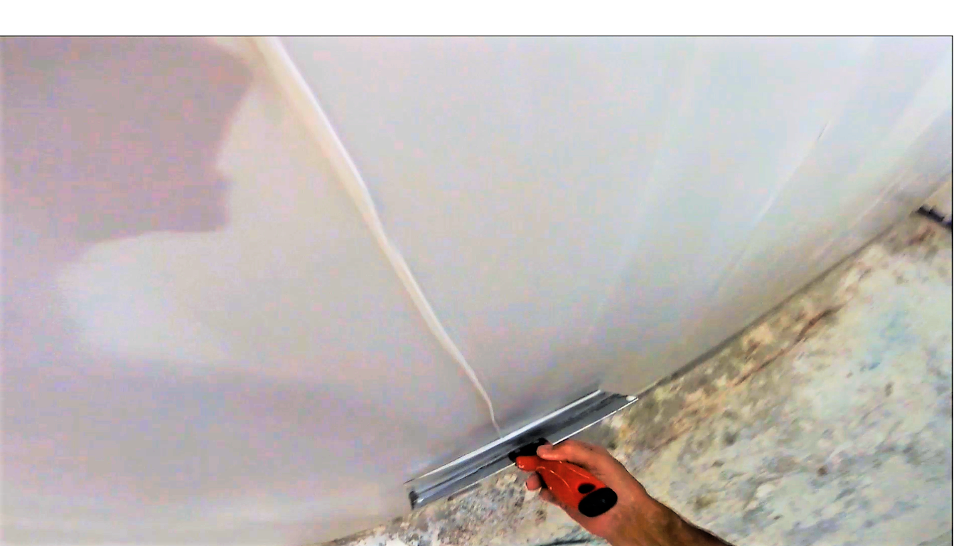 skim coating drywall with roller